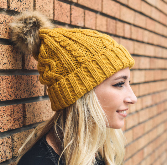 Cable Knit Beanie With Faux Fur Pom in Mustard